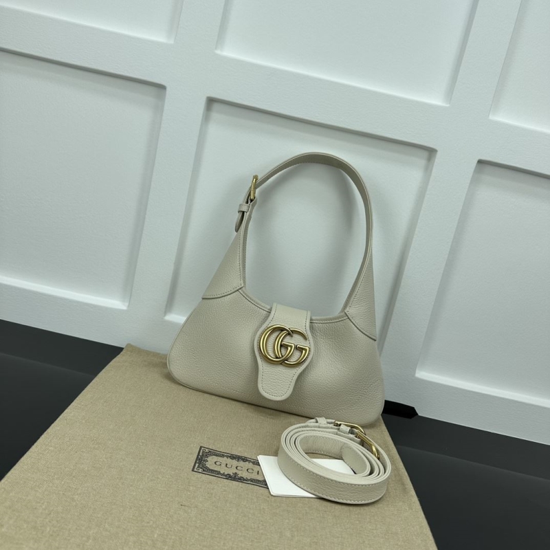 G*u*i top handle bags